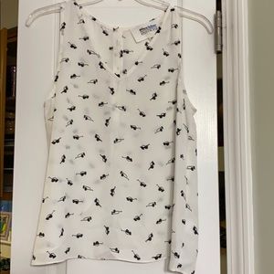 White V-neck sleeveless blouse